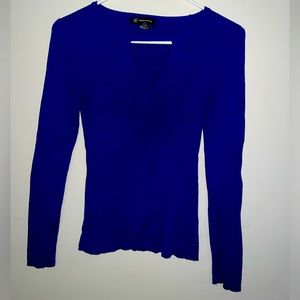 Dark rich blue sweater. Material is very cooling.